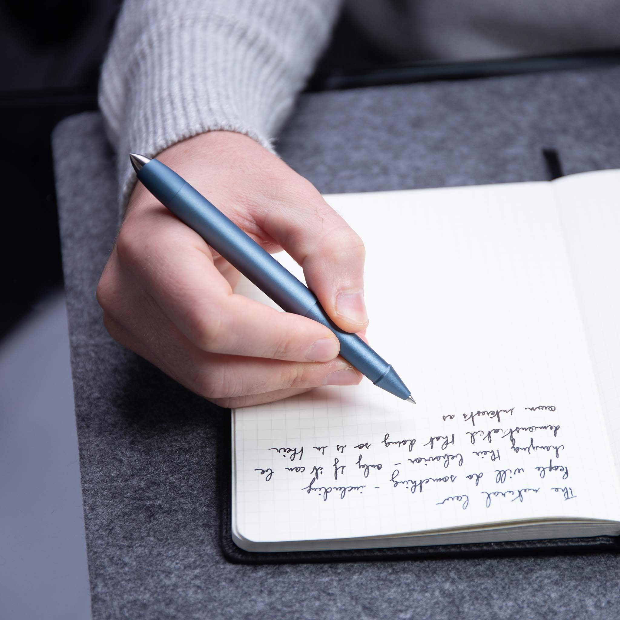 writing with blue rollerball pen hoverpen future#50858600366383