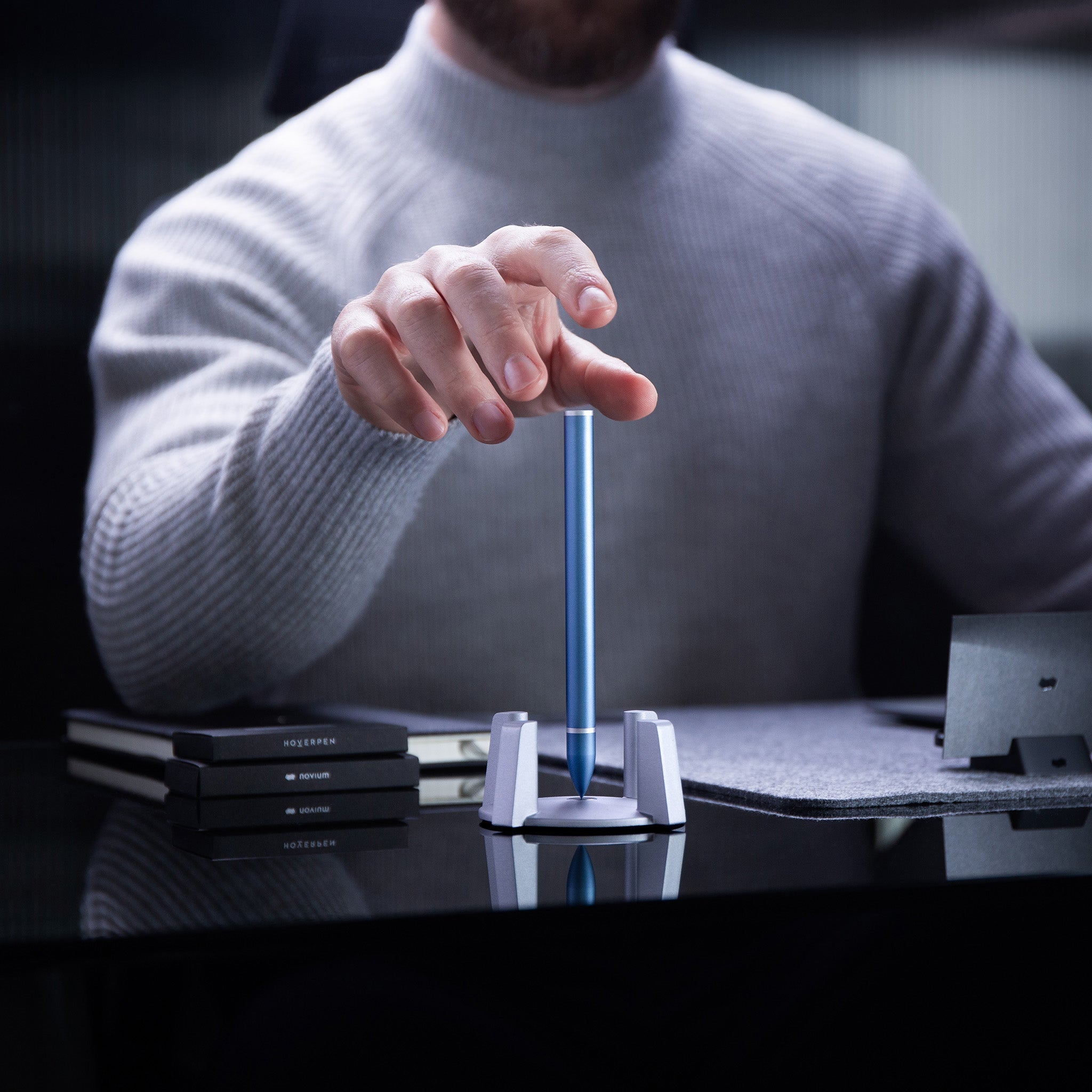 blue ballpoint pen hoverpen classic on desk#45212296282415